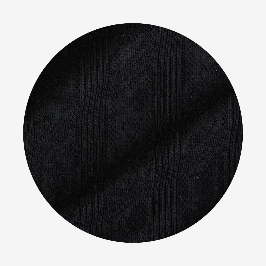 Black Pointelle Footie Ruffled Zippered One Piece